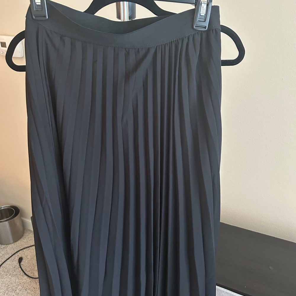 Never worn, elastic waist band.